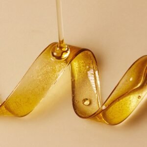 Amber facial oil ribbon — LA LUMÉA texture