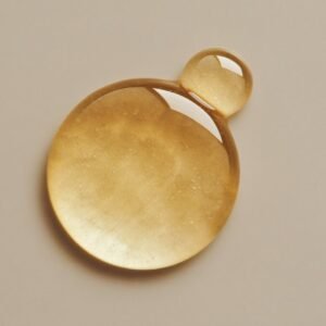 Golden serum droplet — LA LUMÉA serum texture
